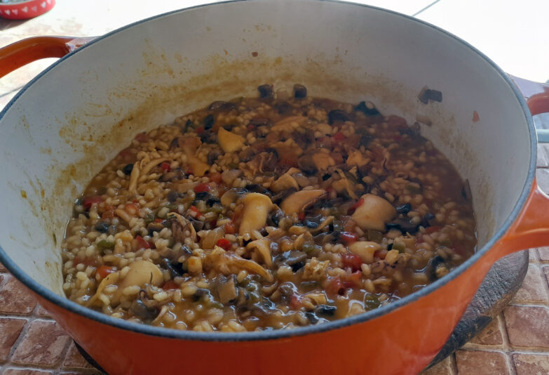 arroz meloso con chipirones y boletus