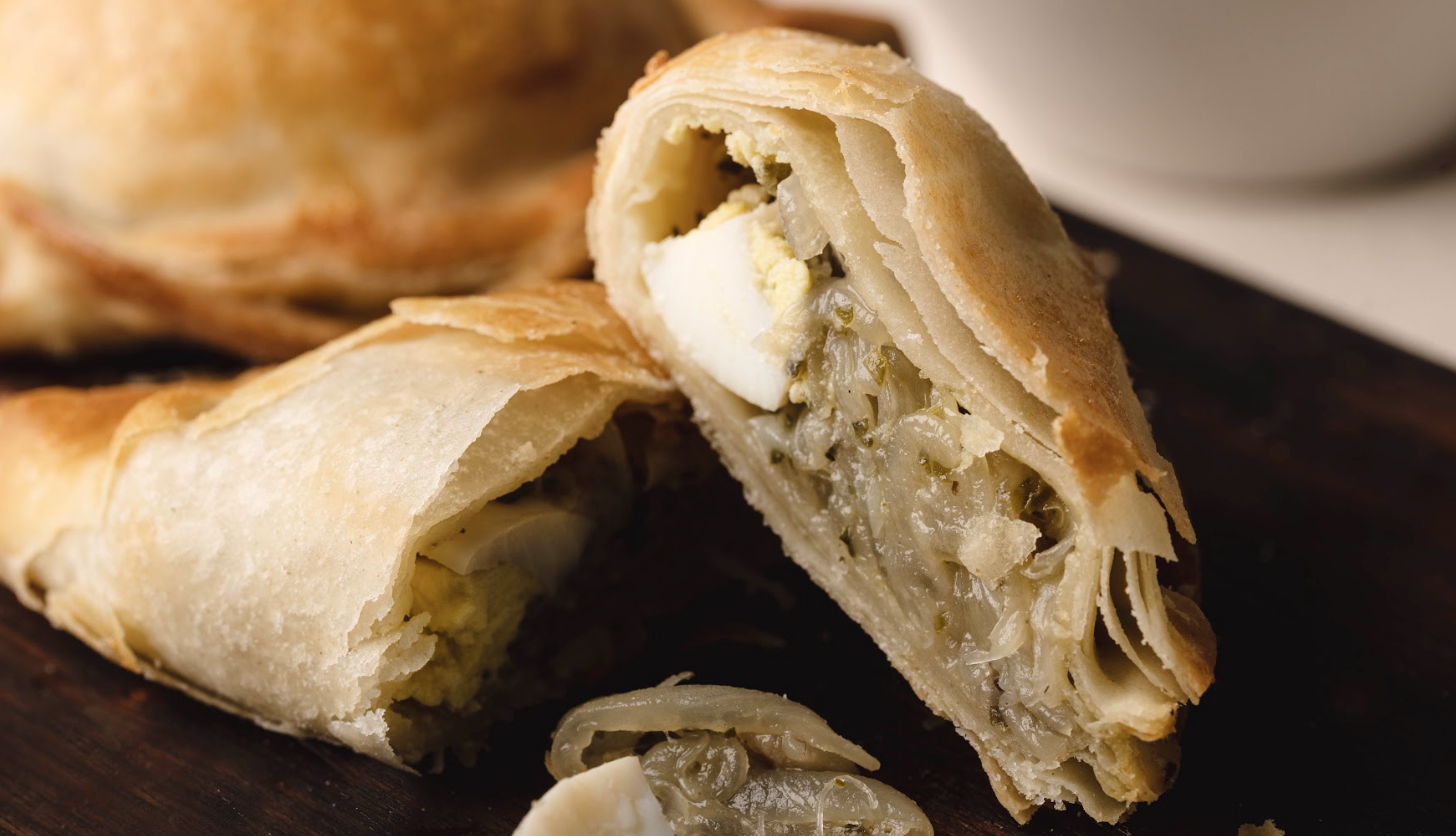 Onion Empanada with Tomato Sauce