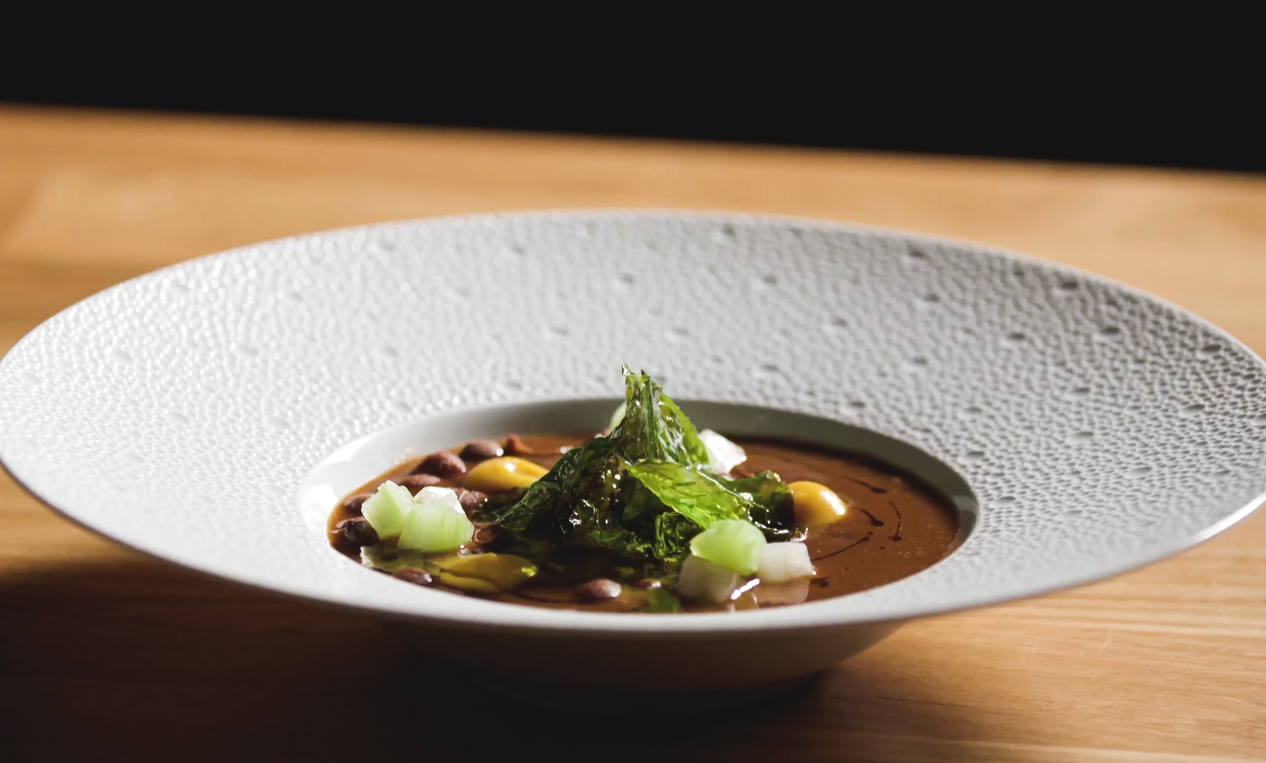 Cantabrian red beans stew, vegetables and fried collards