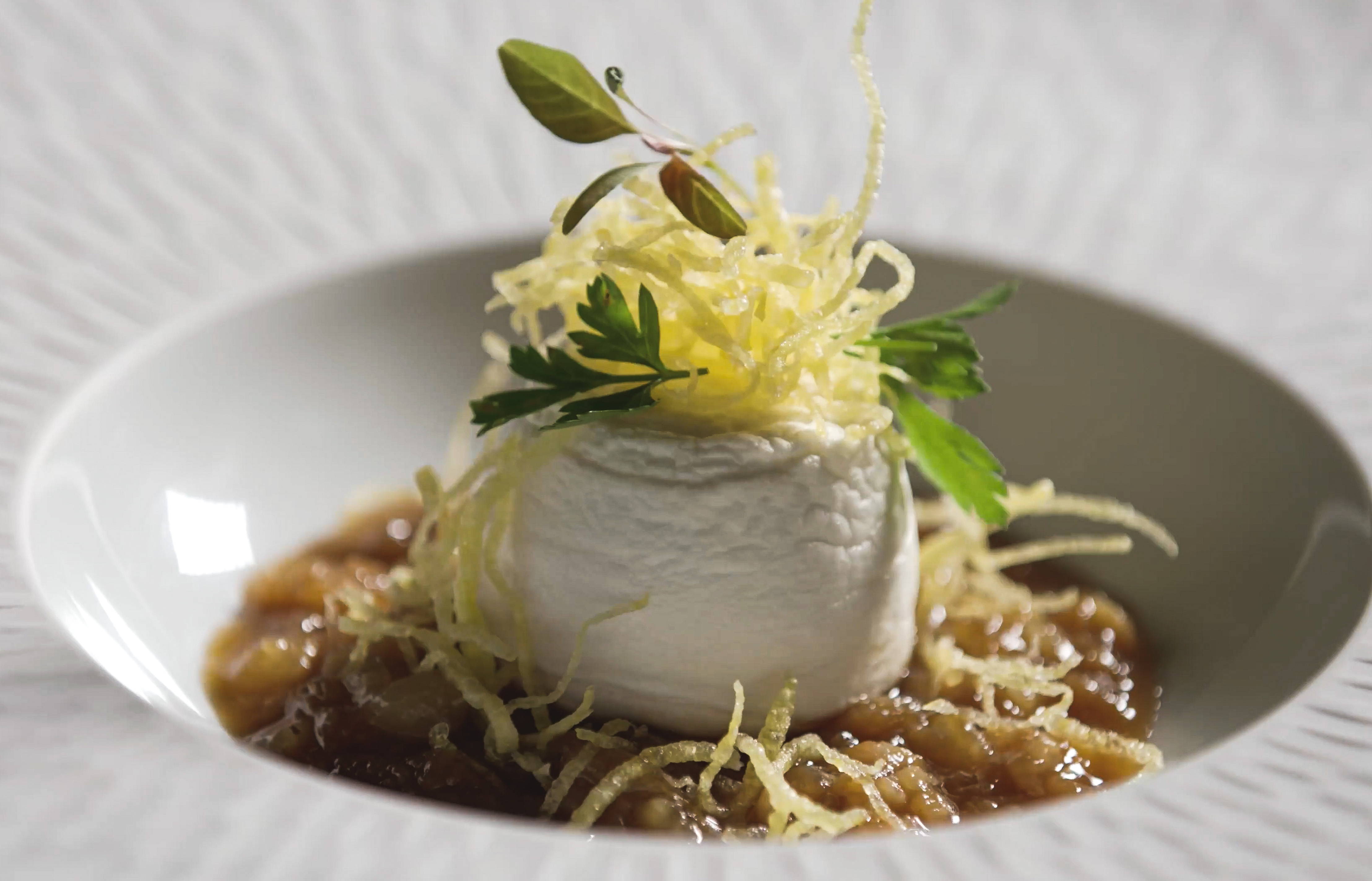 Egg timbale with cod tripe and potato “straw”