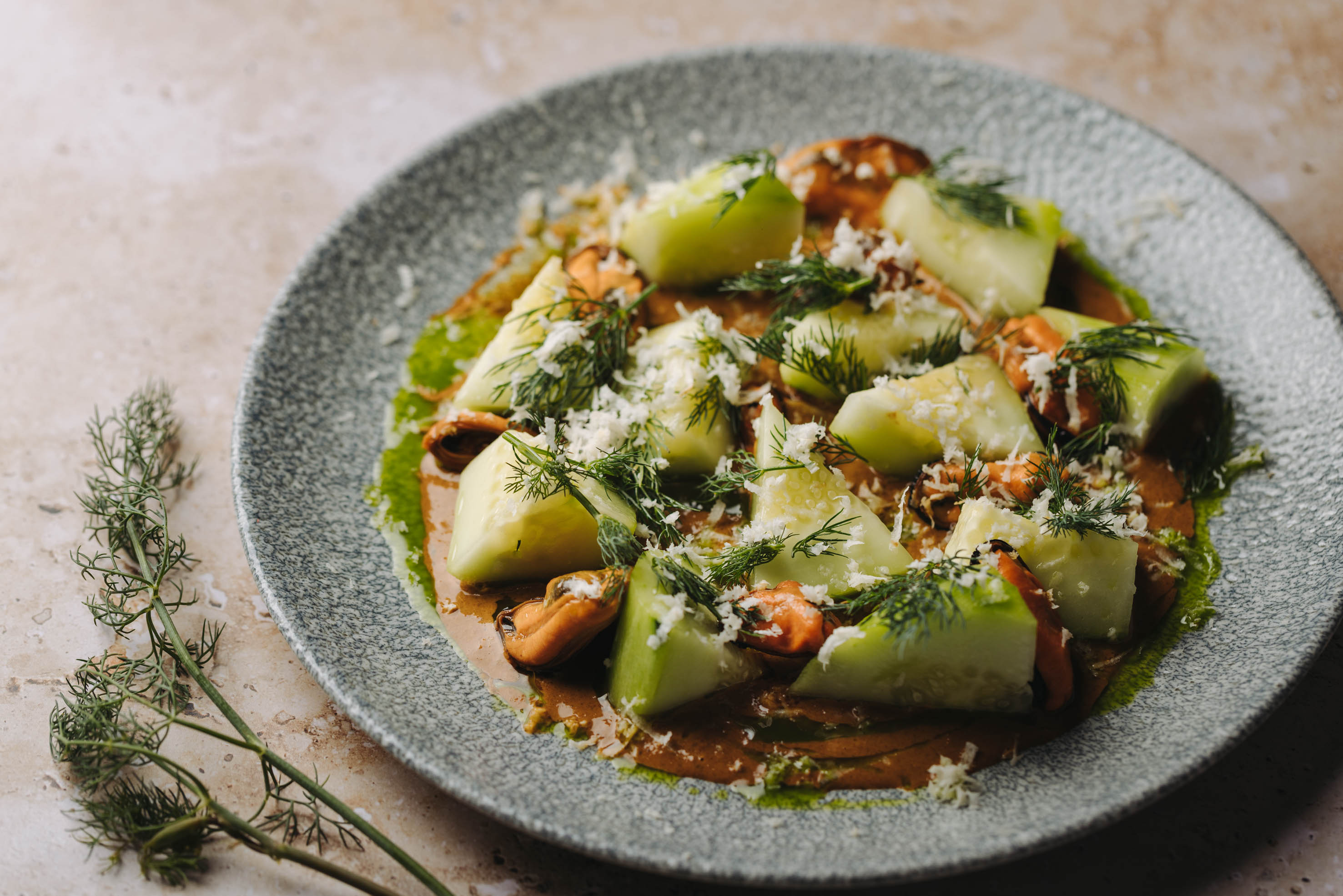 Cucumber salad with smoked mussels and horseradish