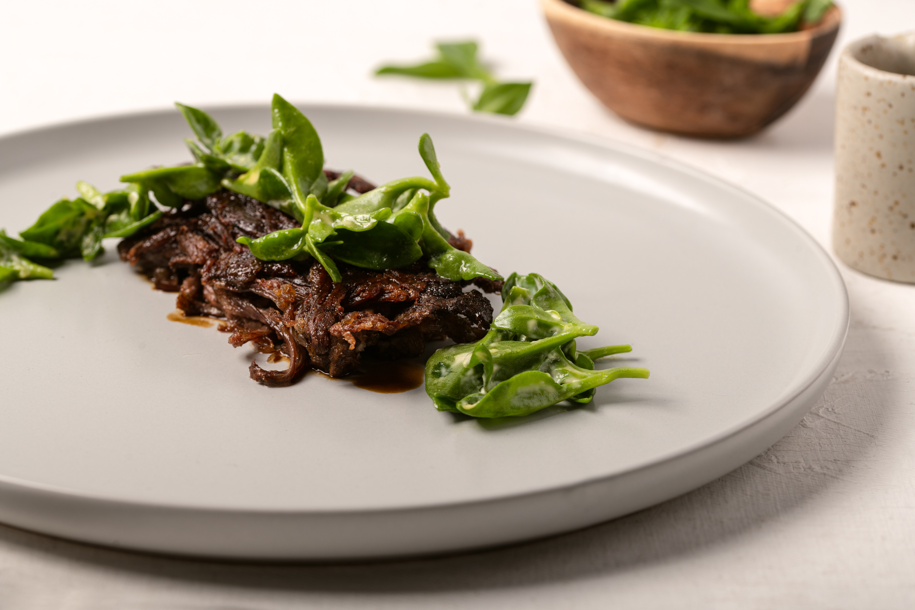 Short rib barbecue with romeritos and asmoky jus