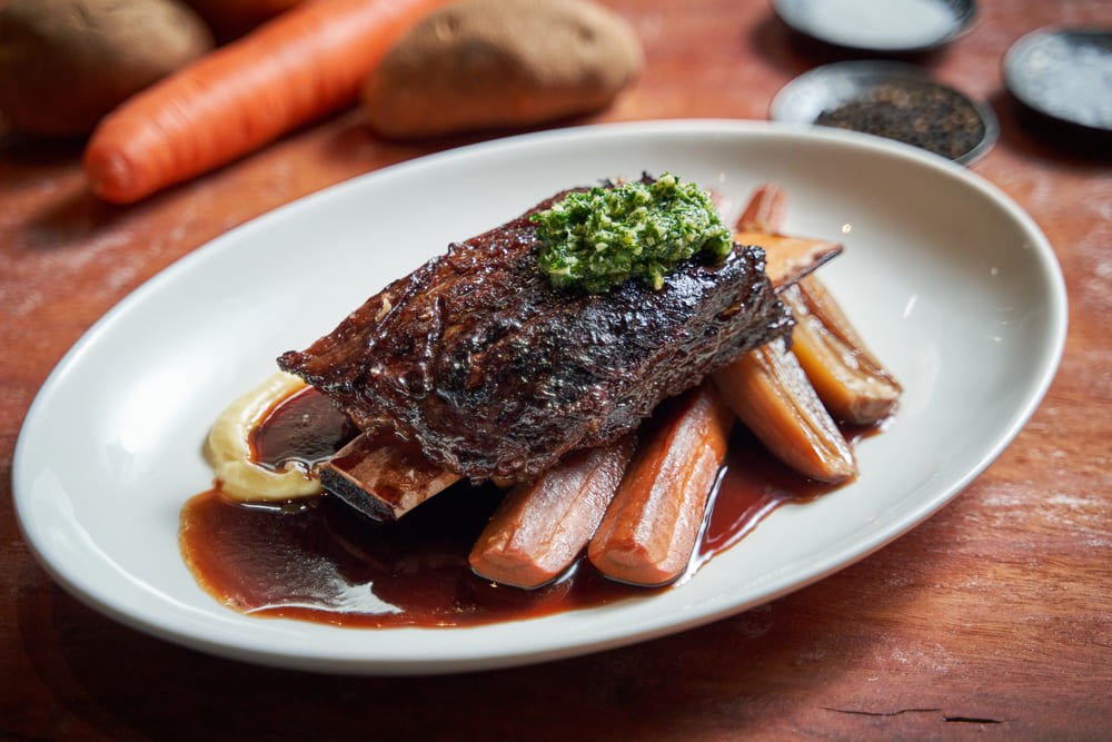 Beef ribs with smoked potato puree and gremolata