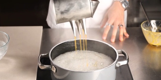 Thread egg yolks using a funnel (fine-tip dispenser)